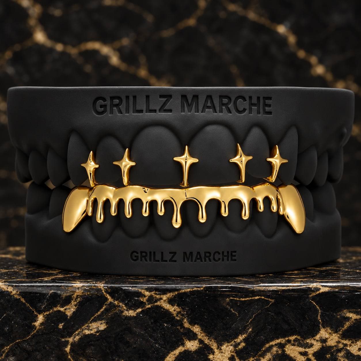 Stelline sopra e drip sotto · effetto oro — design di grillz su misura dell'atelier Grillz Marche, realizzabile sul calco dei tuoi denti