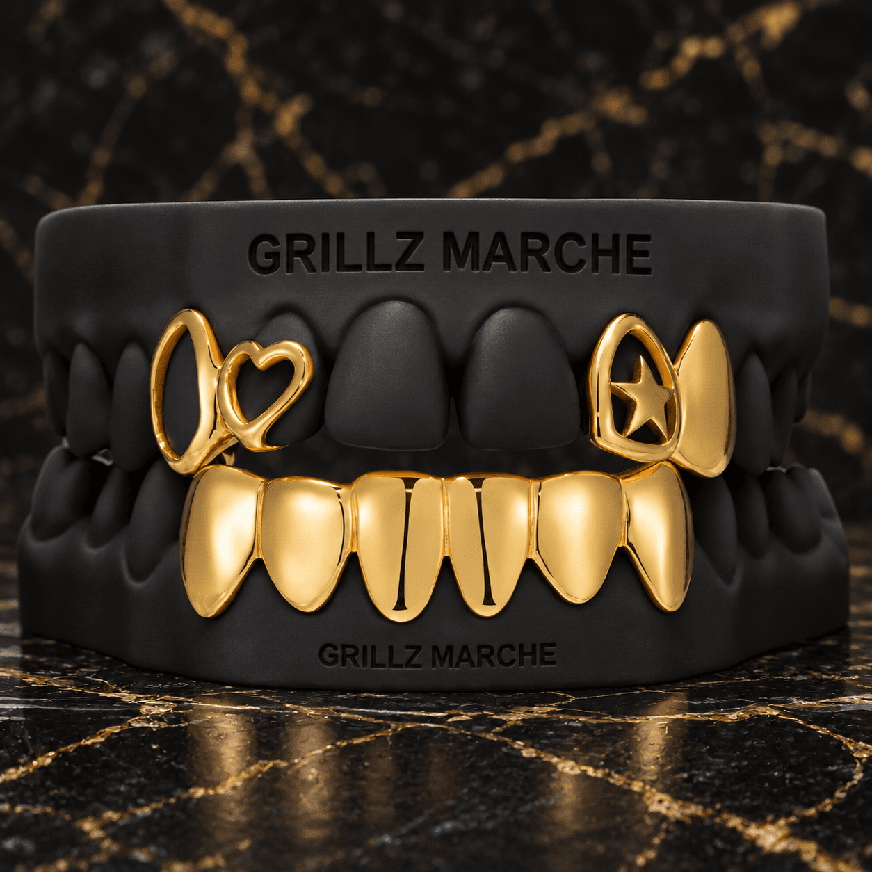 Cuore, stella e zanne · 12 denti · effetto oro — design di grillz su misura dell'atelier Grillz Marche, realizzabile sul calco dei tuoi denti