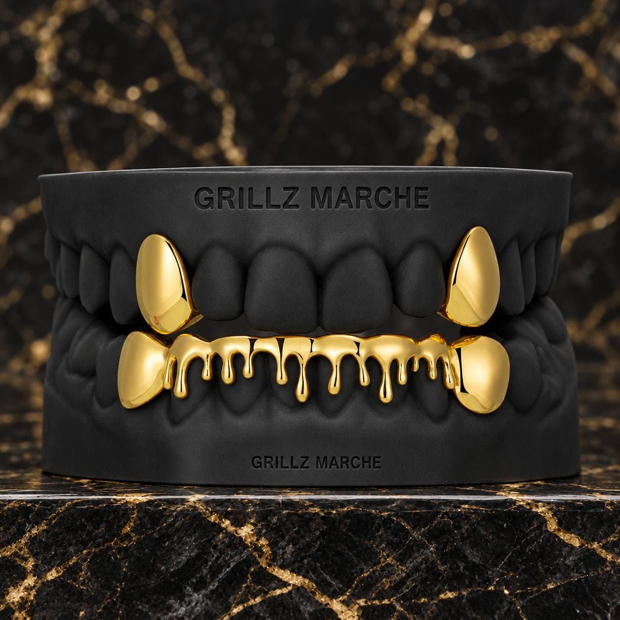 Drip con zanne · 10 denti · effetto oro — design di grillz su misura dell'atelier Grillz Marche, realizzabile sul calco dei tuoi denti