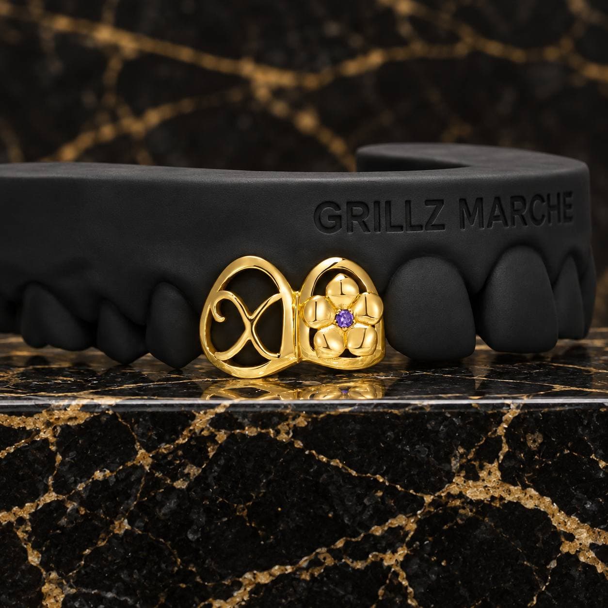 Fiore e nodo · 2 denti · PVD effetto oro — design di grillz su misura dell'atelier Grillz Marche, realizzabile sul calco dei tuoi denti